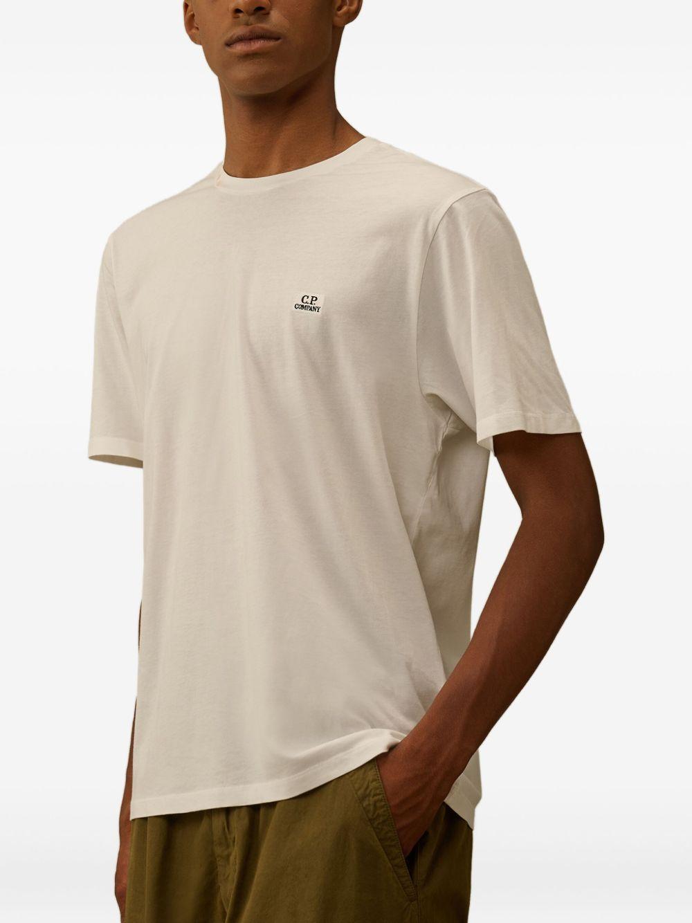 CP COMPANY T-shirt in cotone beige con logo 