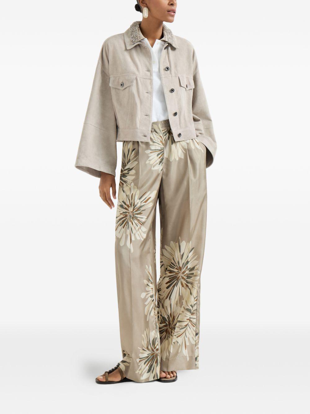 BRUNELLO CUCINELLI Polo in cotone bianco con colletto in maglia e paillettes 