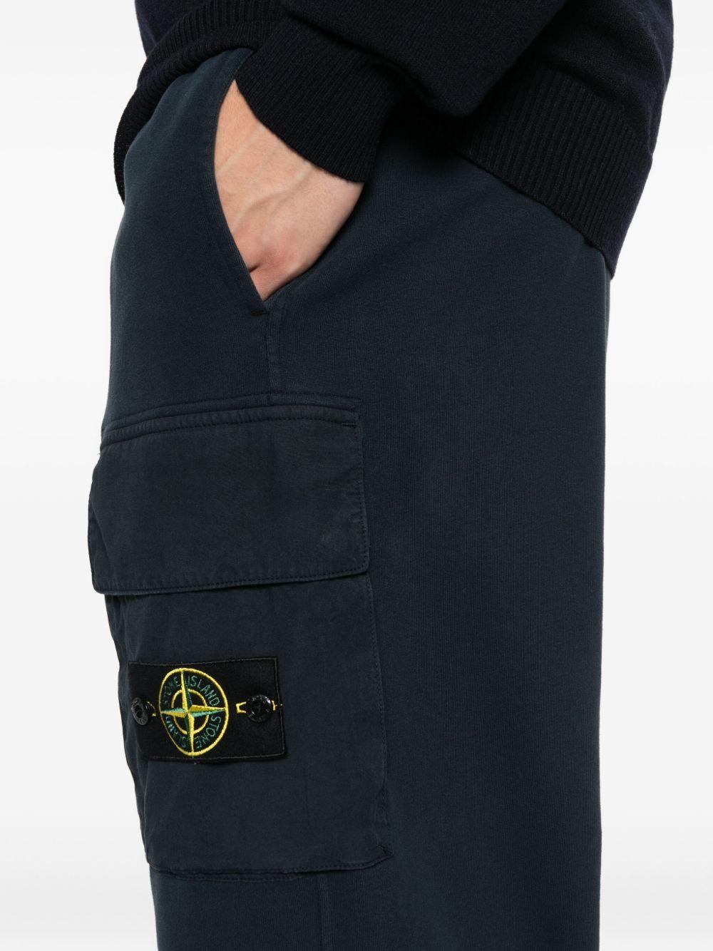STONE ISLAND Pantaloni sportivi con patch logo e tasche 