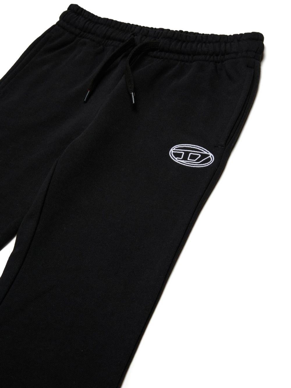 DIESEL Pantaloni svasati in cotone nero con logo 