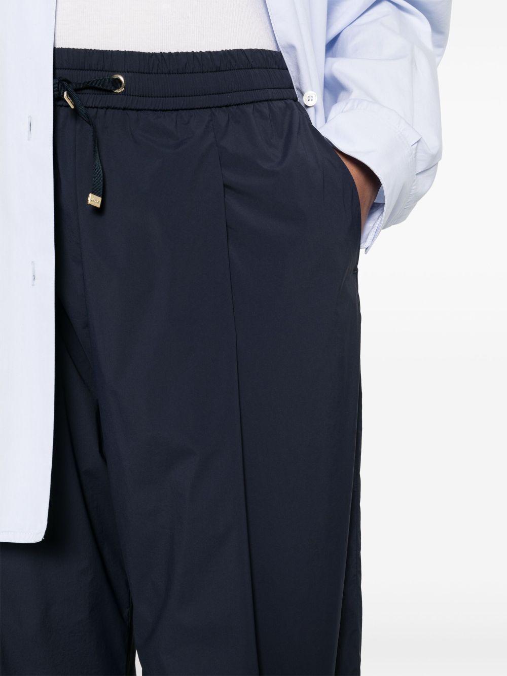 HERNO Pantaloni blu in tessuto tecnico leggero 
