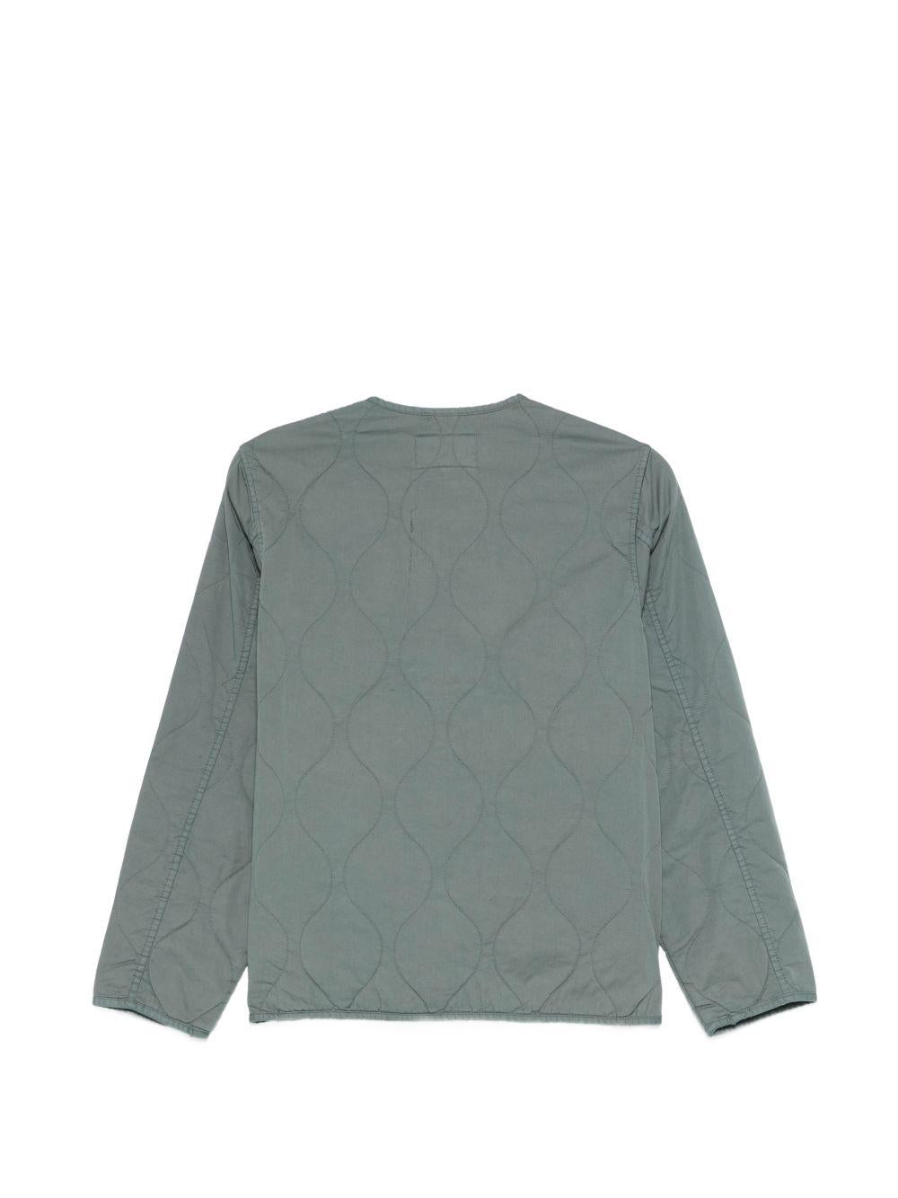 CARHARTT WIP Giacca trapuntata verde con tasche 