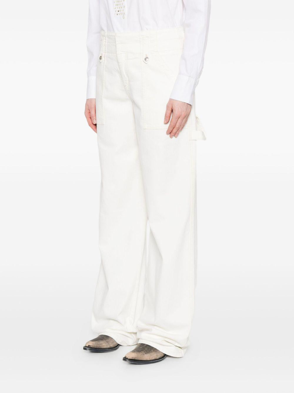 ERMANNO SCERVINO Jeans con decorazione occhielli 