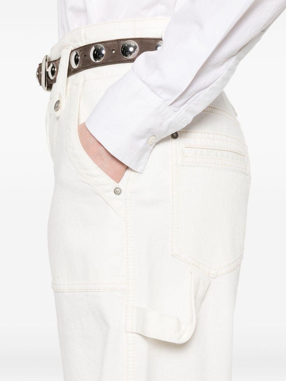 ERMANNO SCERVINO Jeans con decorazione occhielli 