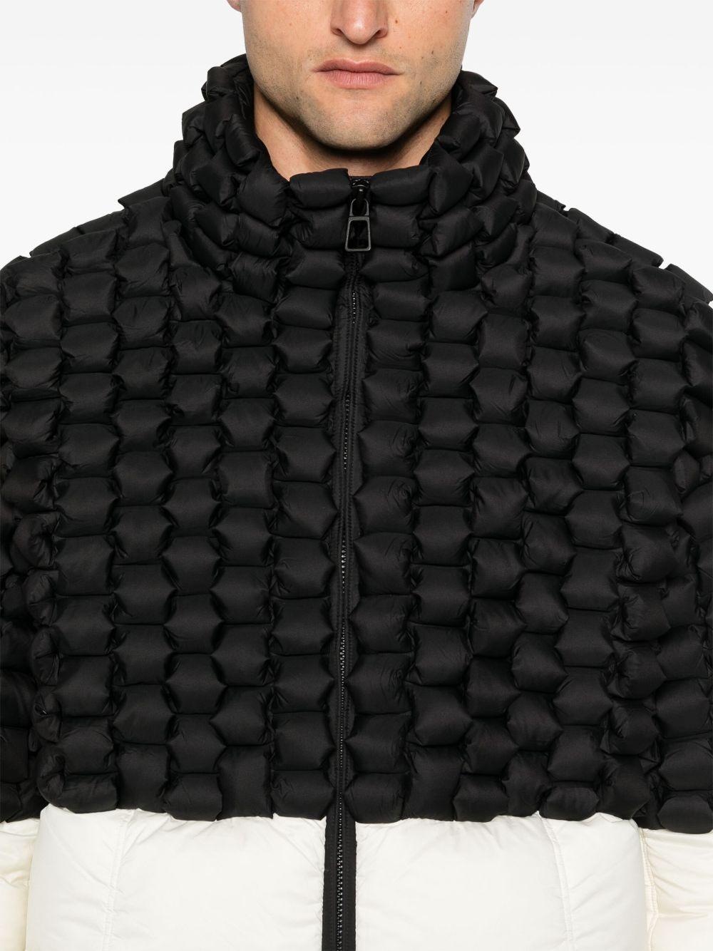 RAXXY Piumino nero e bianco con design trapuntato in 3D 