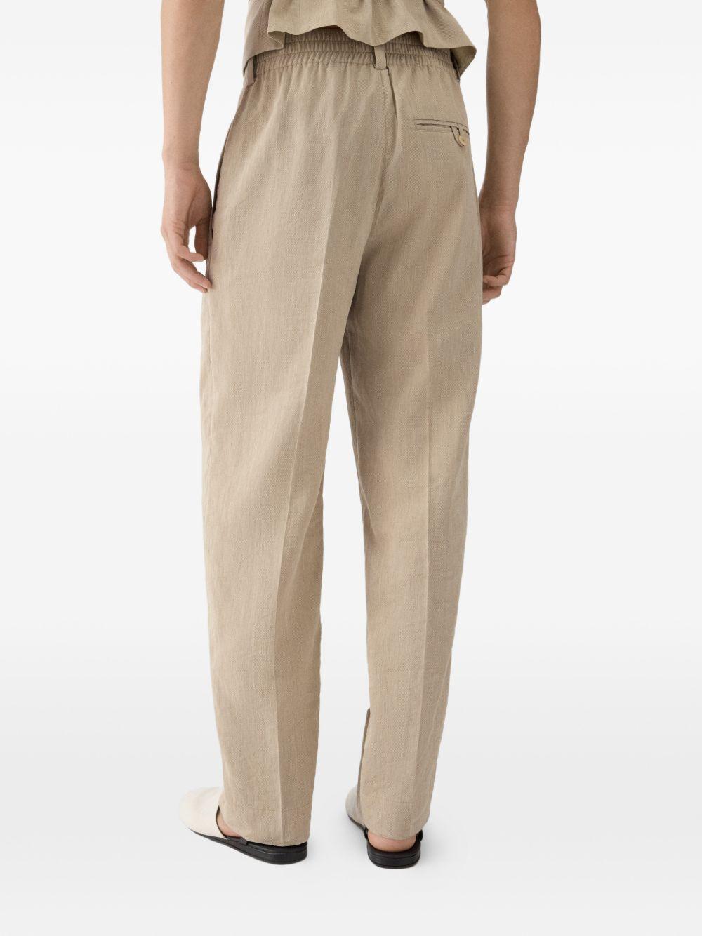 JACQUEMUS Pantaloni Croisière in cone beige con pinces 