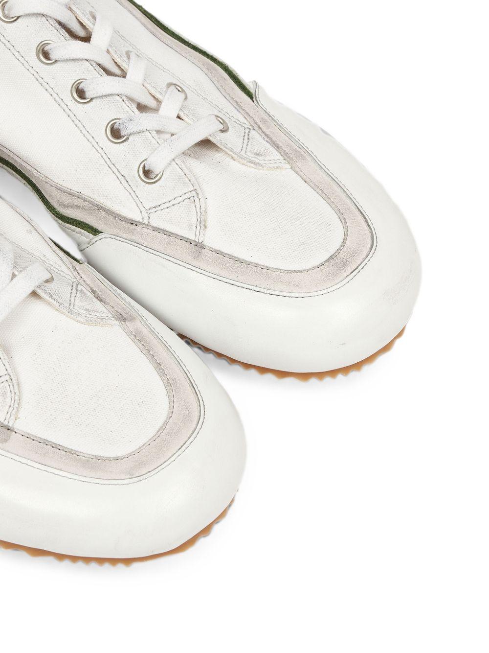 MAISON MARGIELA Sneakers Traveler in pelle e tessuto bianche 