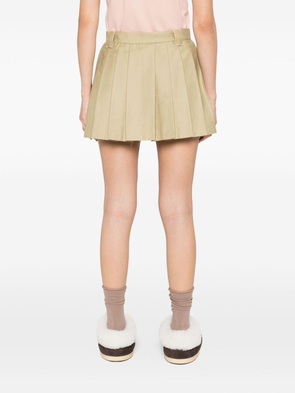 MONCLER Gonna a trapezio plissettata con logo ricamato 